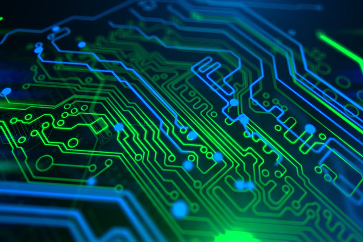 Blue and green computerized lines outline circuits on a dark background